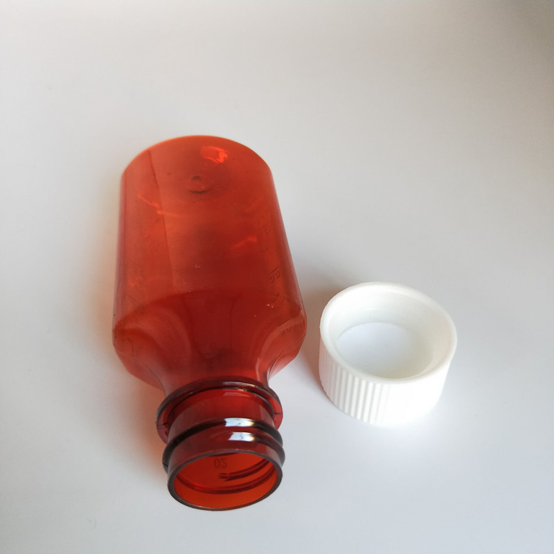 2オンス60ミリリットル薬ペット液体楕円形ボトル、子供に耐性のあるキャップ付き